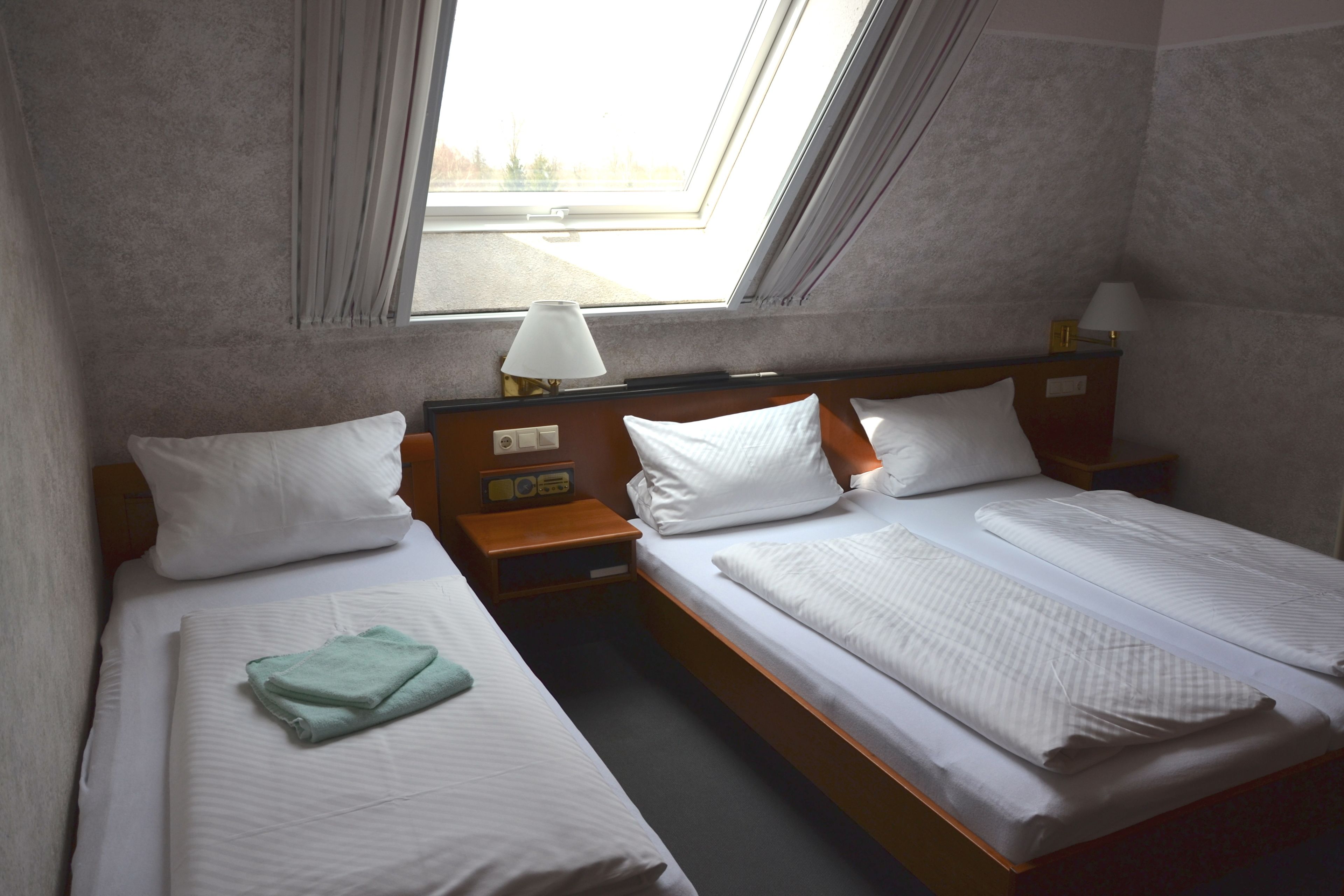 hypo-allergenic bedding, desk, blackout curtains, free cots/infant beds