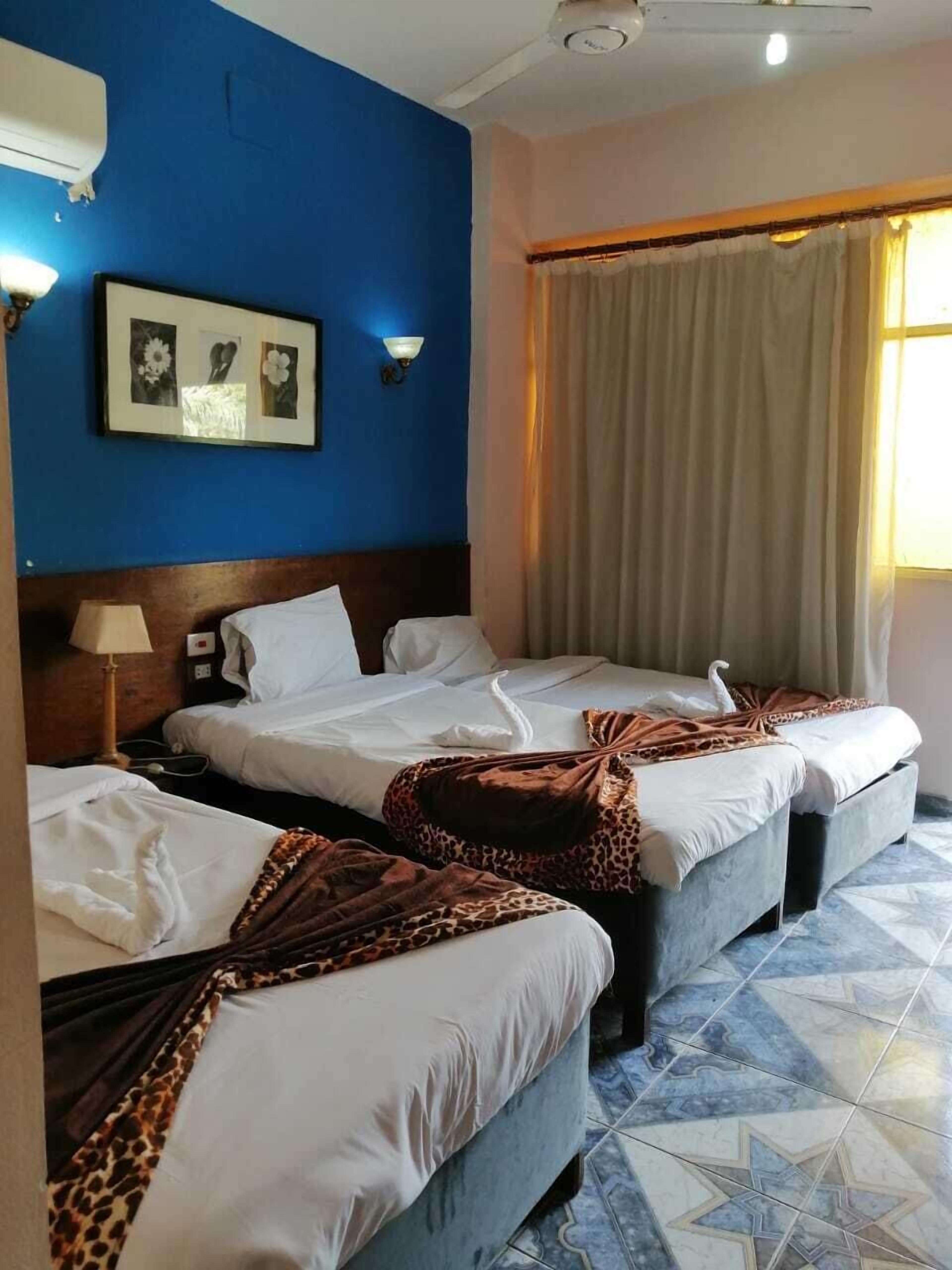 1 dormitorio, tabla de planchar con plancha, wifi gratis y ropa de cama