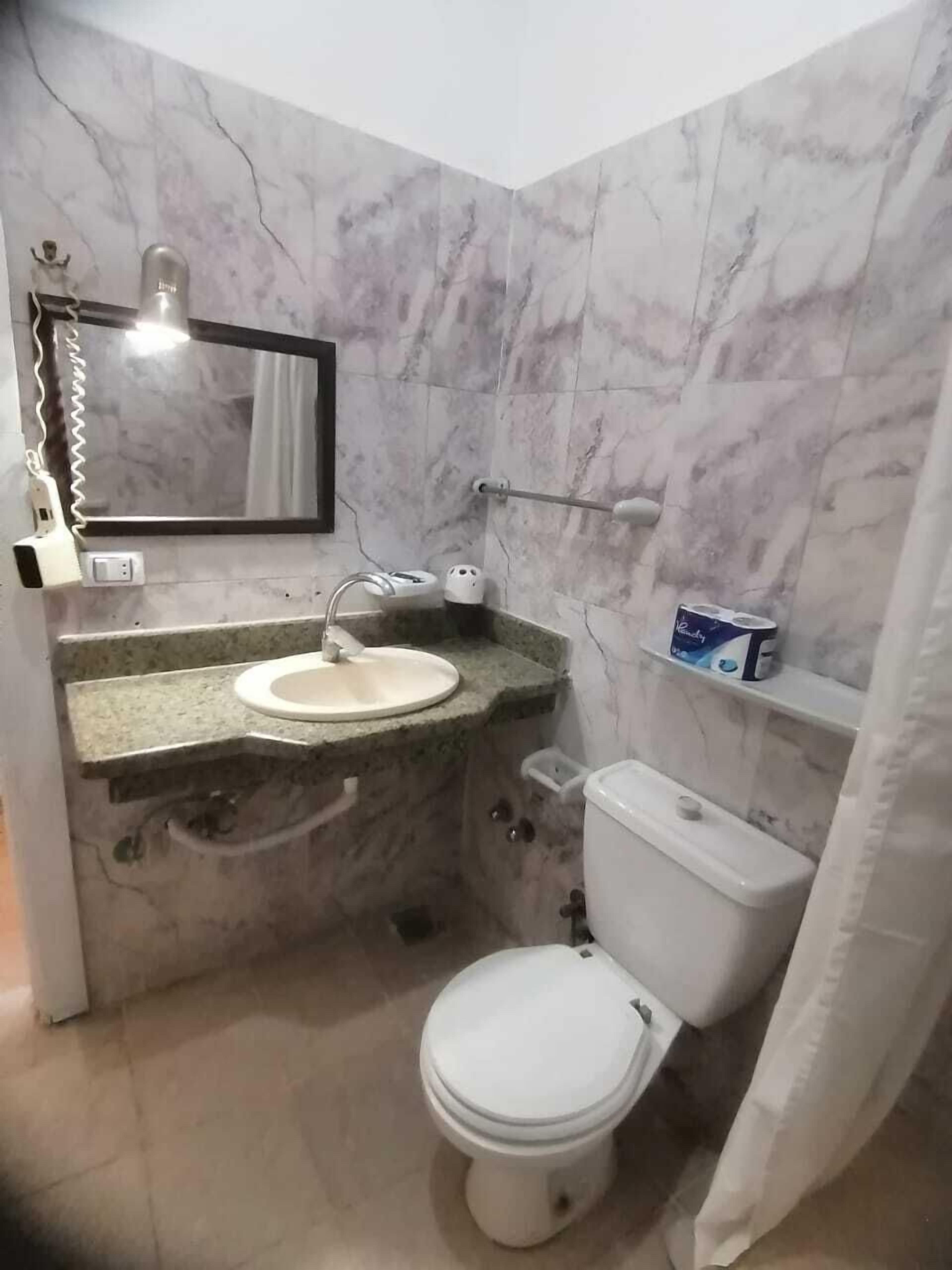 bathtub, free toiletries, hair dryer, towels