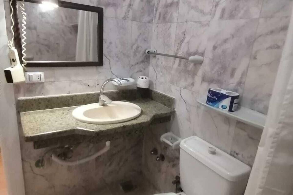 bathtub, free toiletries, hair dryer, towels