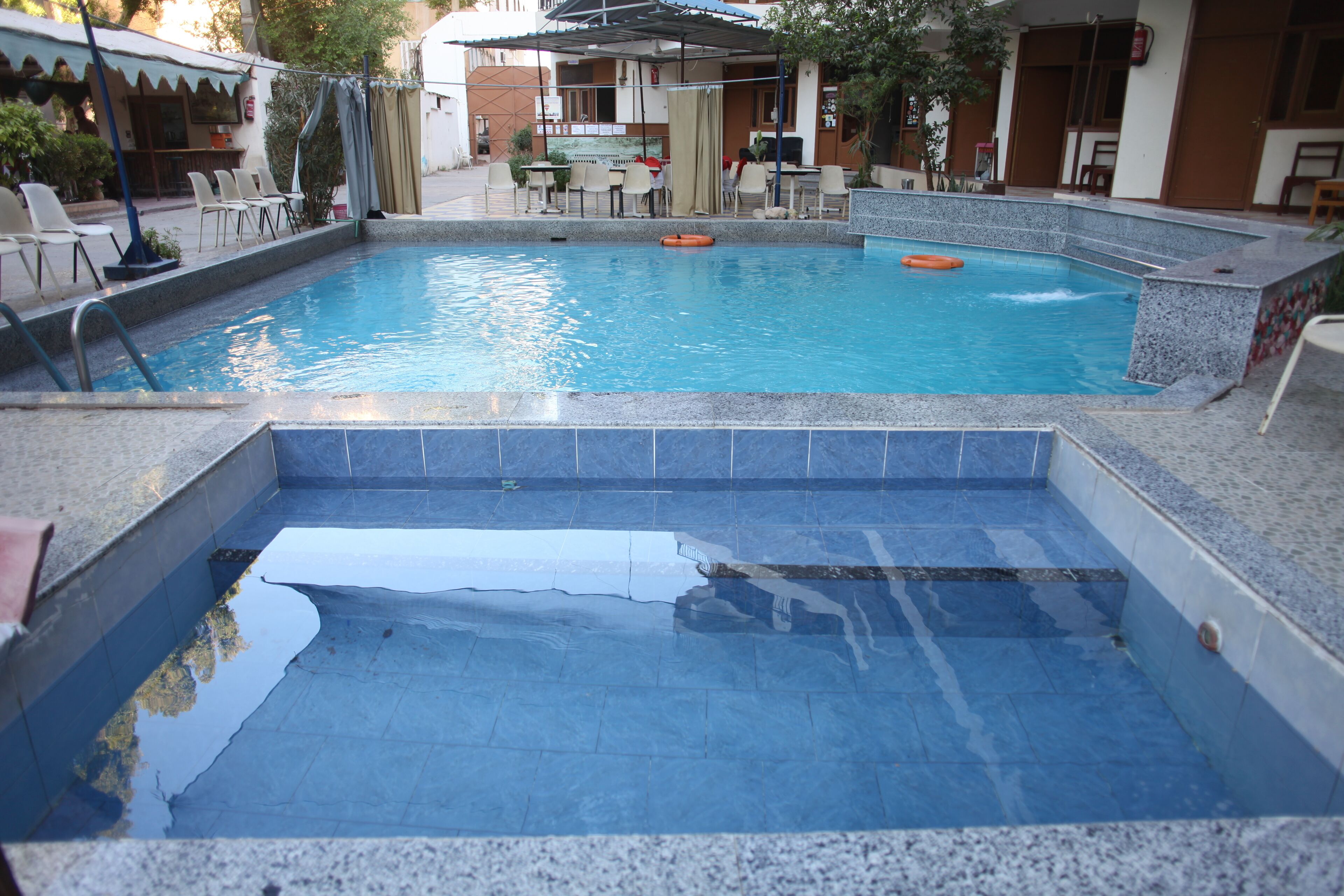 outdoor pool, pool loungers