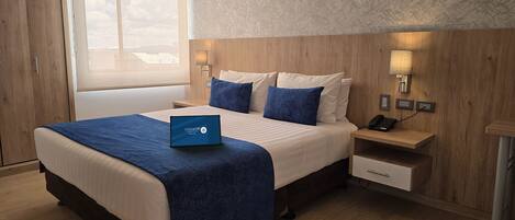 1 quarto, edredons de pluma, frigobar, cofres nos quartos