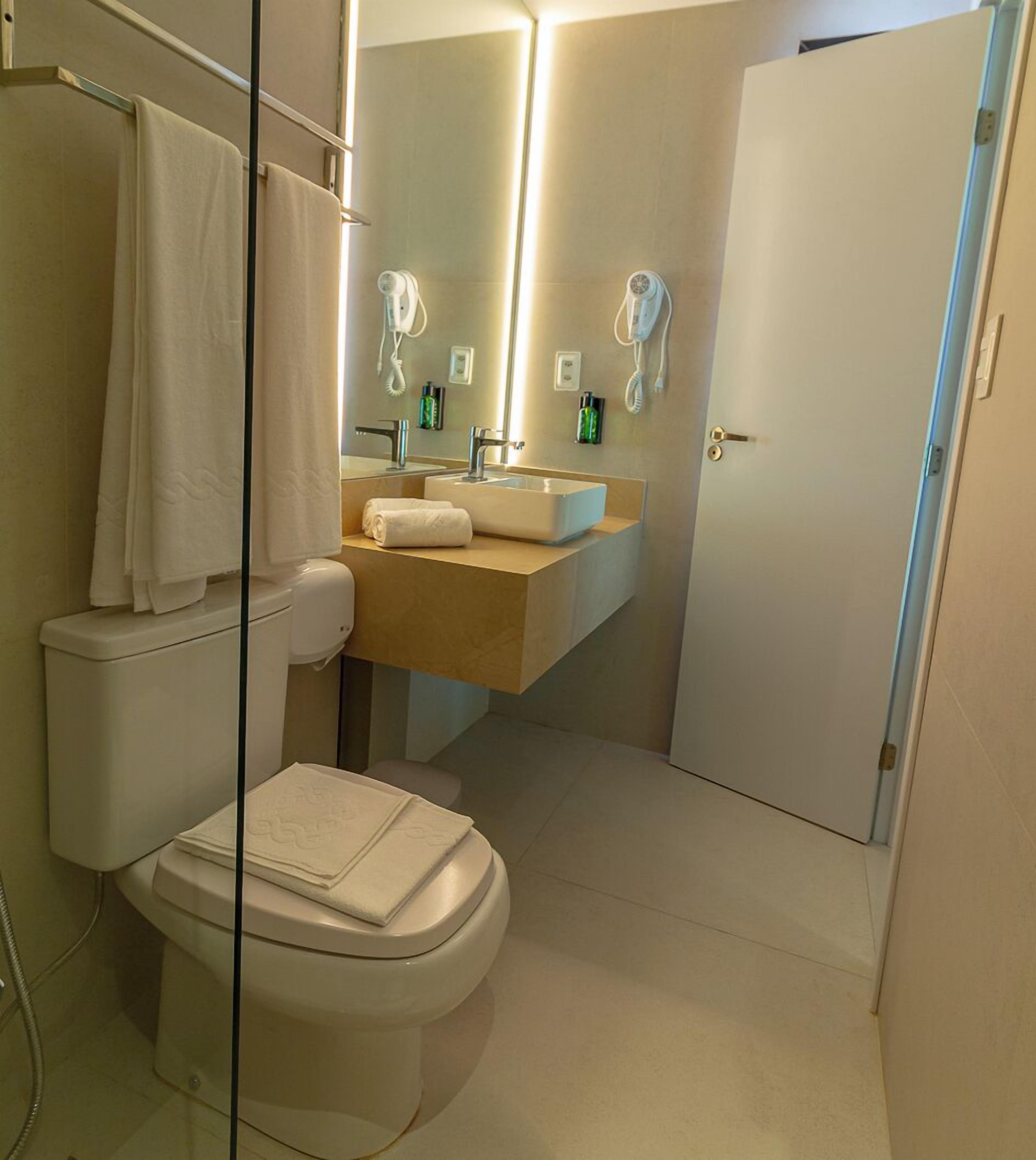 shower, free toiletries, hair dryer, towels