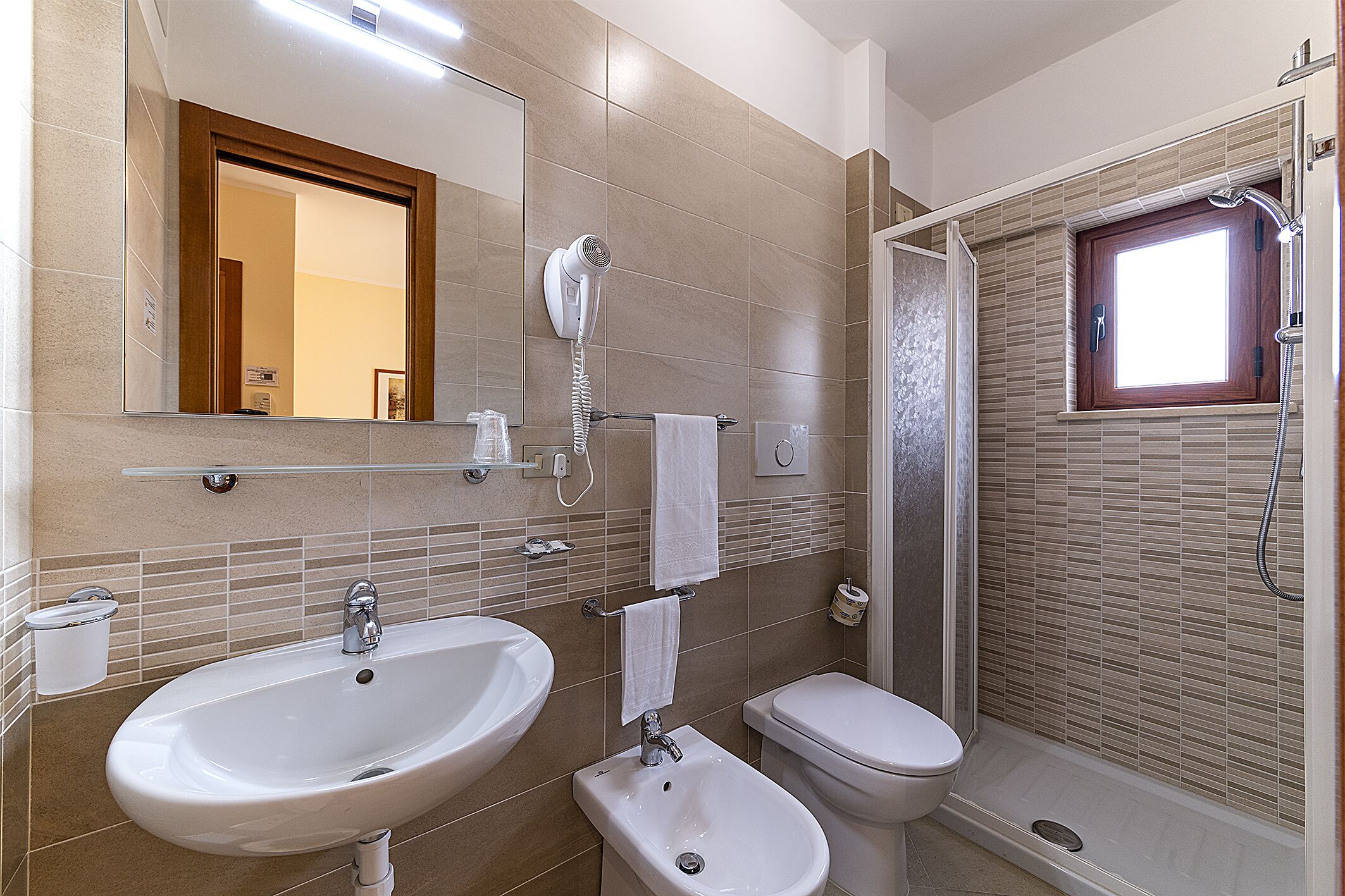single room | bathroom | rainfall showerhead, free toiletries, hair dryer, bidet