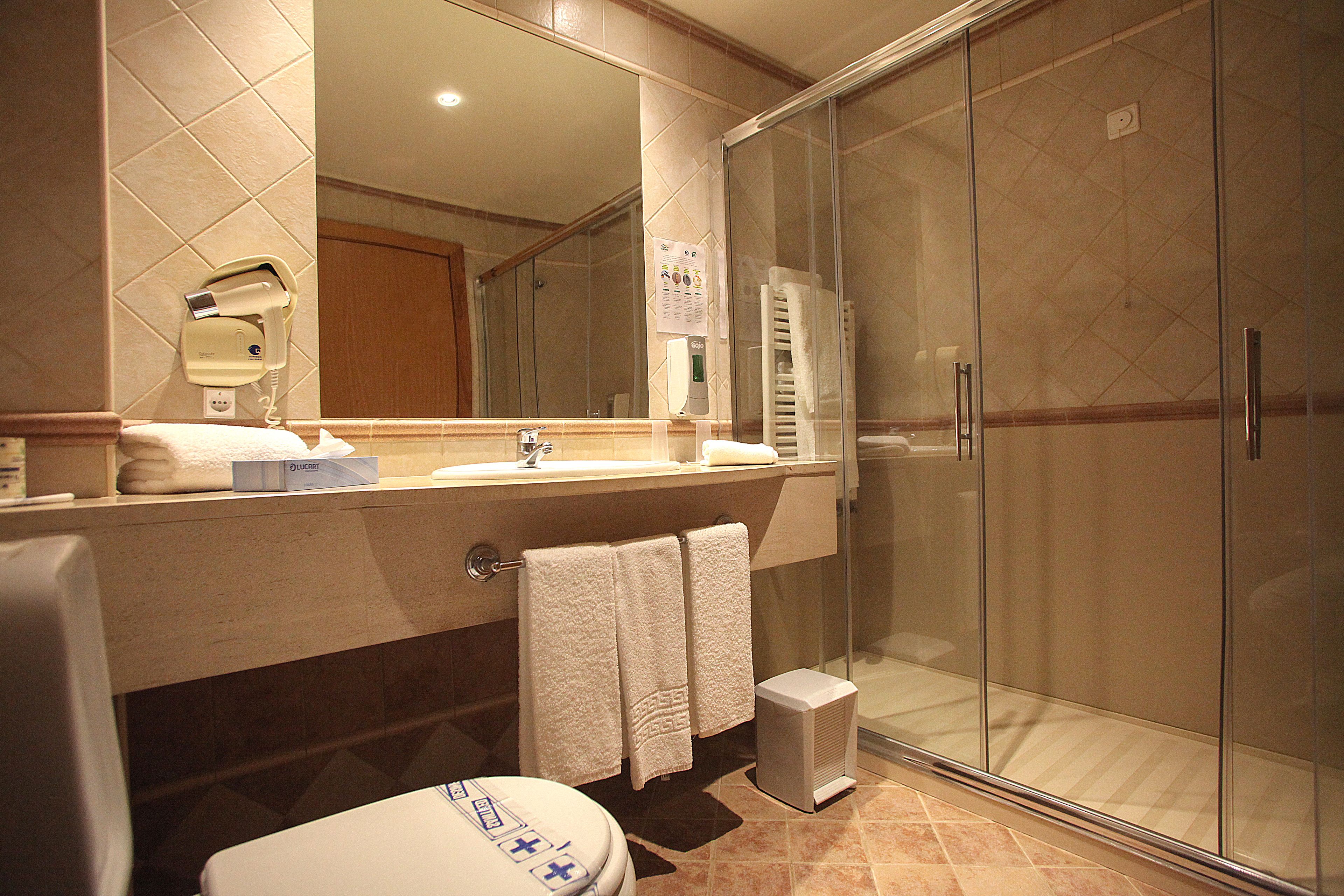 shower, free toiletries, hair dryer, bathrobes