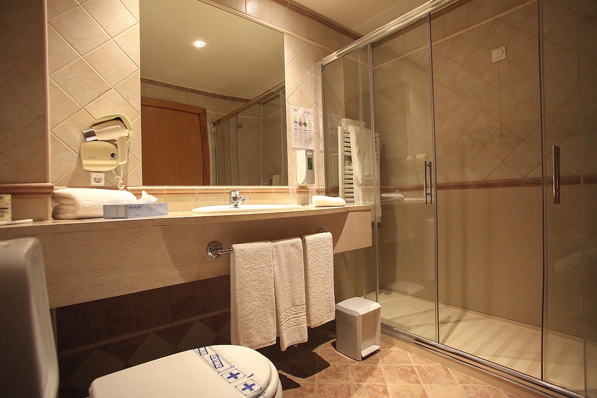 shower, free toiletries, hair dryer, bathrobes