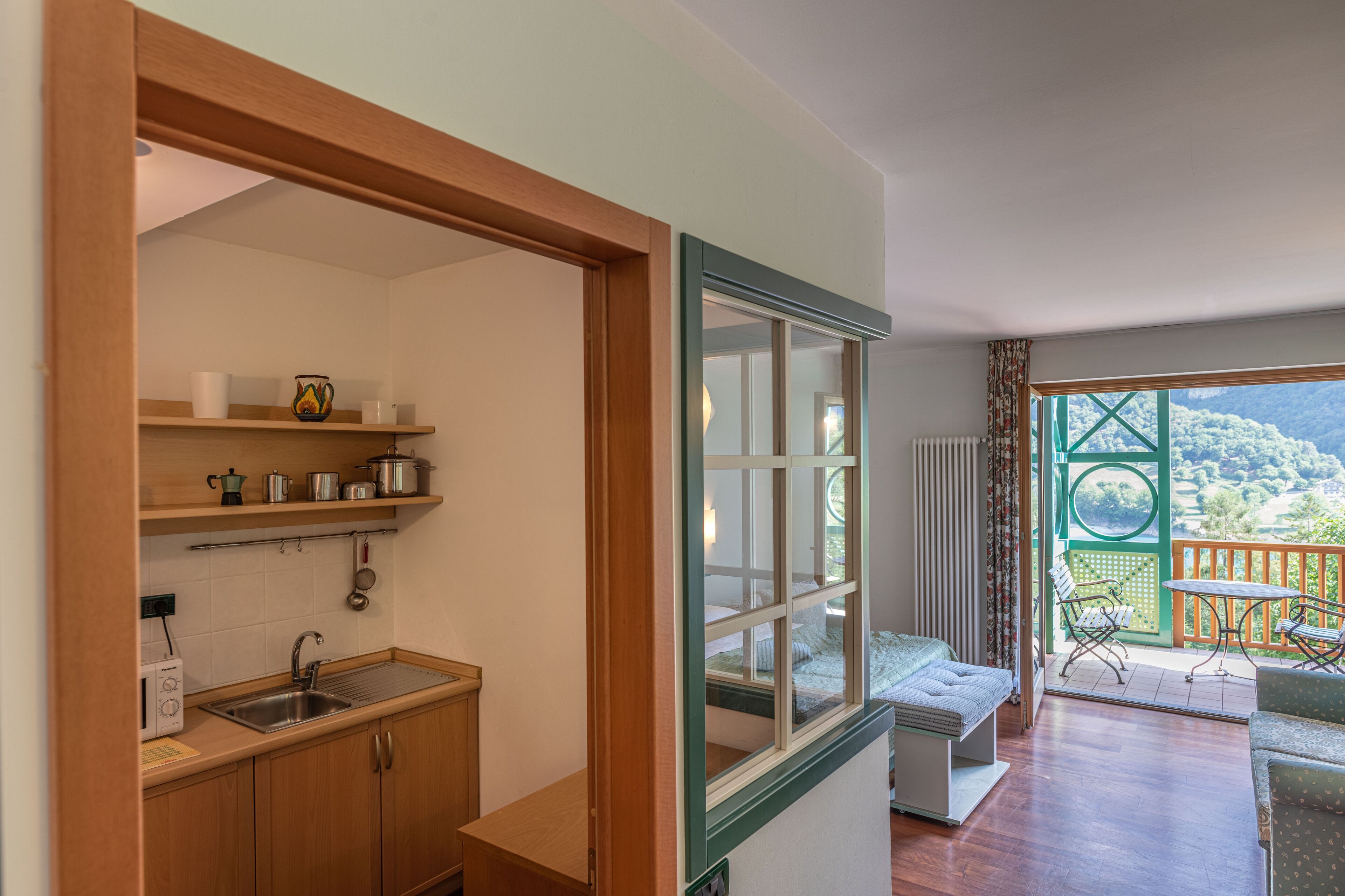 studio, kitchenette, lake view | 1 bedroom, desk, blackout curtains, free wifi