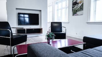 Standard Apartment, 1 Bedroom | Living area | 42-inch flat-screen TV with satellite channels, TV