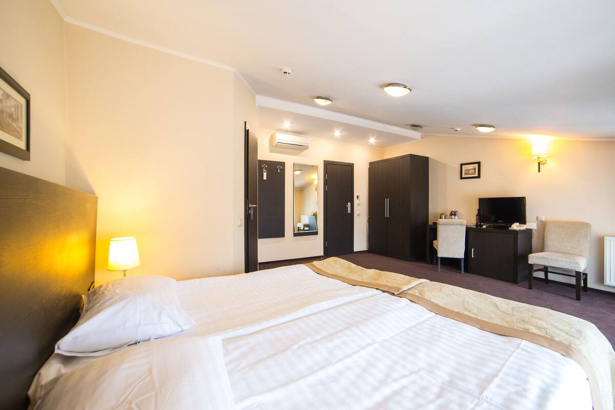 Superior Double or Twin Room | Minibar, in-room safe, desk, iron/ironing board (on request)