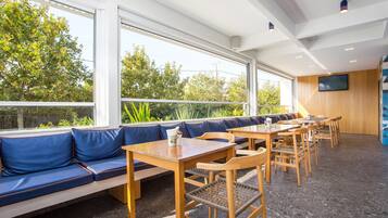 Breakfast, lunch, dinner served; international cuisine