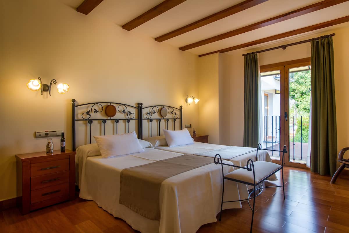 Traditional Twin Room, Balcony | Minibar, in-room safe, desk, laptop workspace