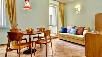 Classic Apartment | Living area | 40-inch TV with digital channels