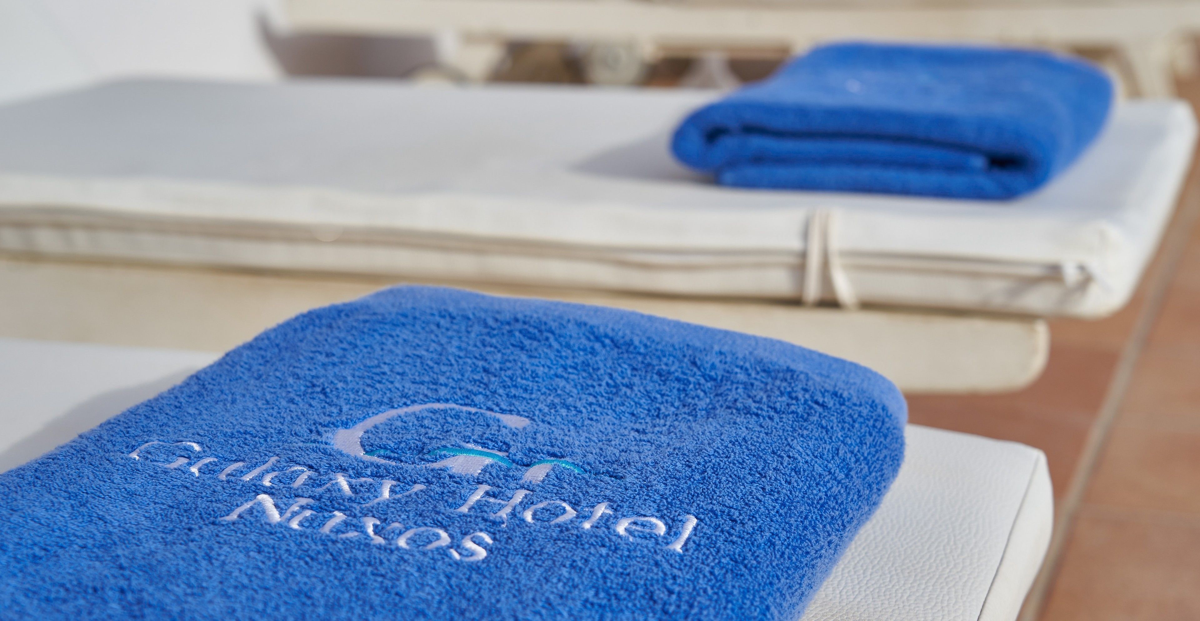 seasonal outdoor pool, open 11:00 am to 7:30 pm, pool umbrellas