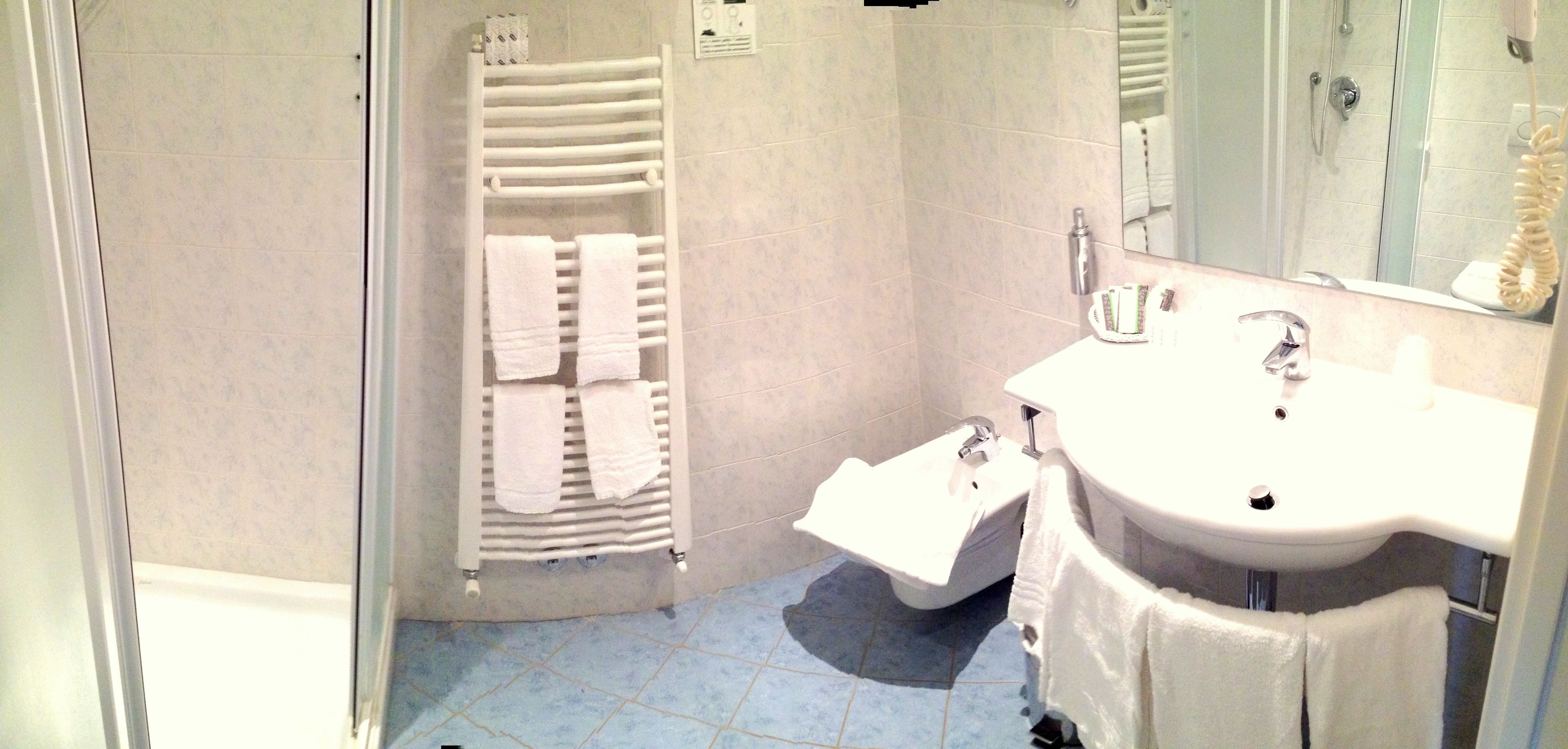 quadruple room | bathroom | shower, free toiletries, hair dryer, towels