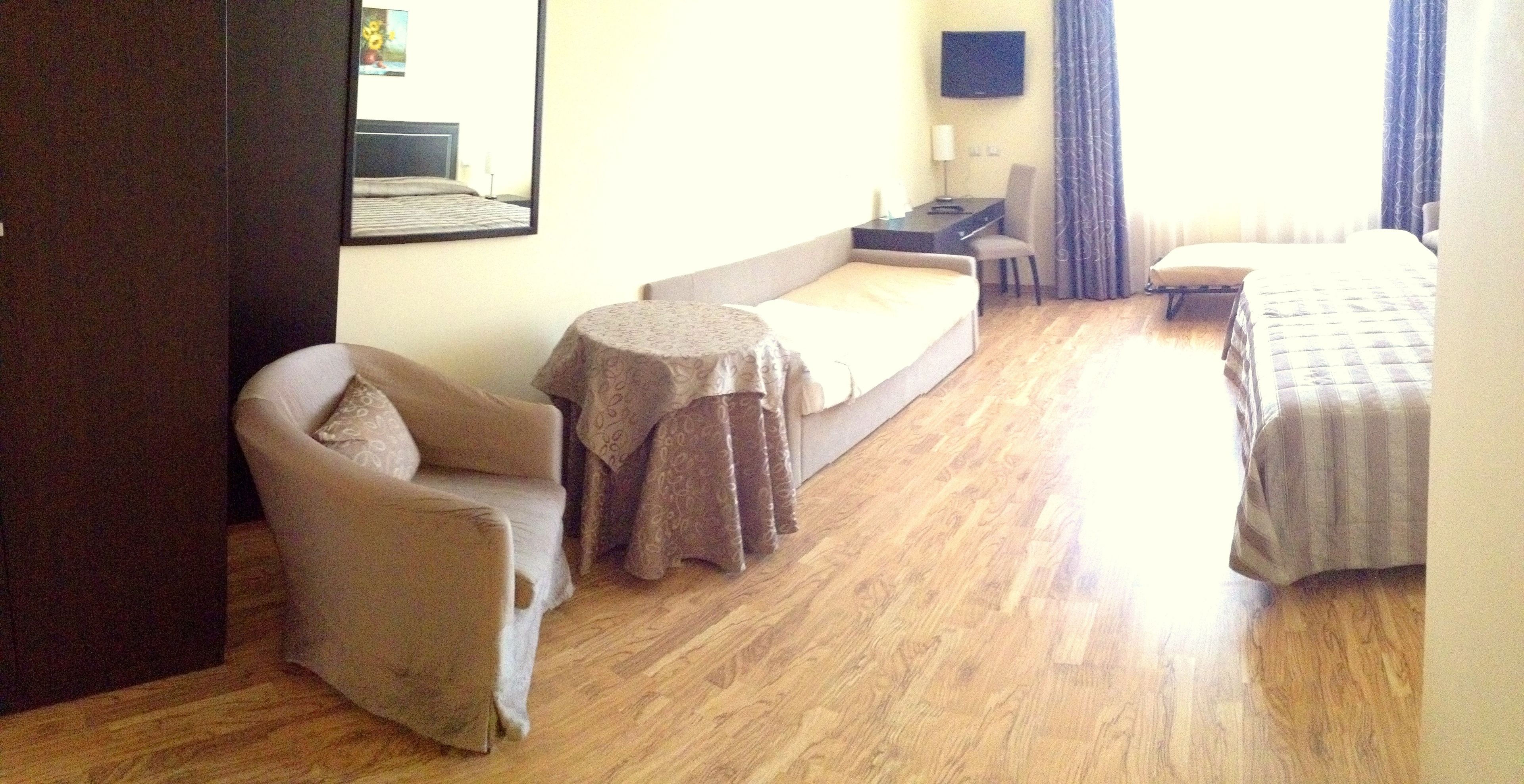 quadruple room | minibar, in-room safe, desk, blackout curtains