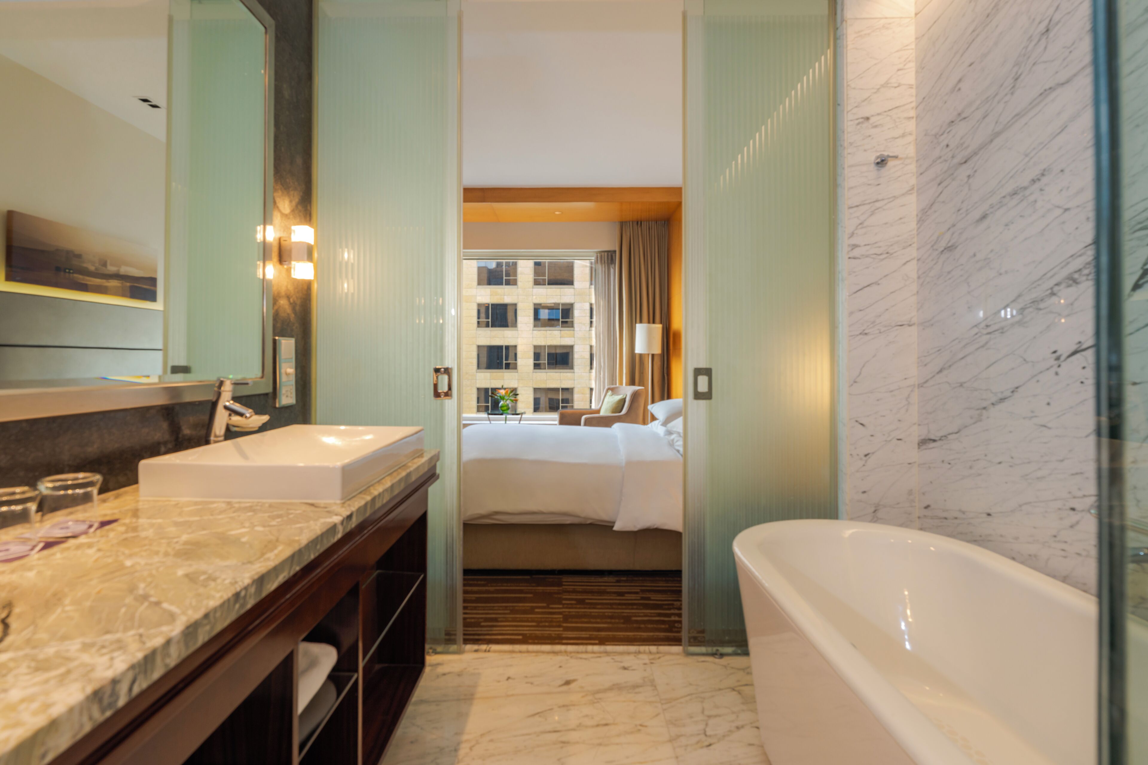 Room, 1 King Bed | Bathroom | Combined shower/tub, rainfall showerhead, free toiletries, hair dryer