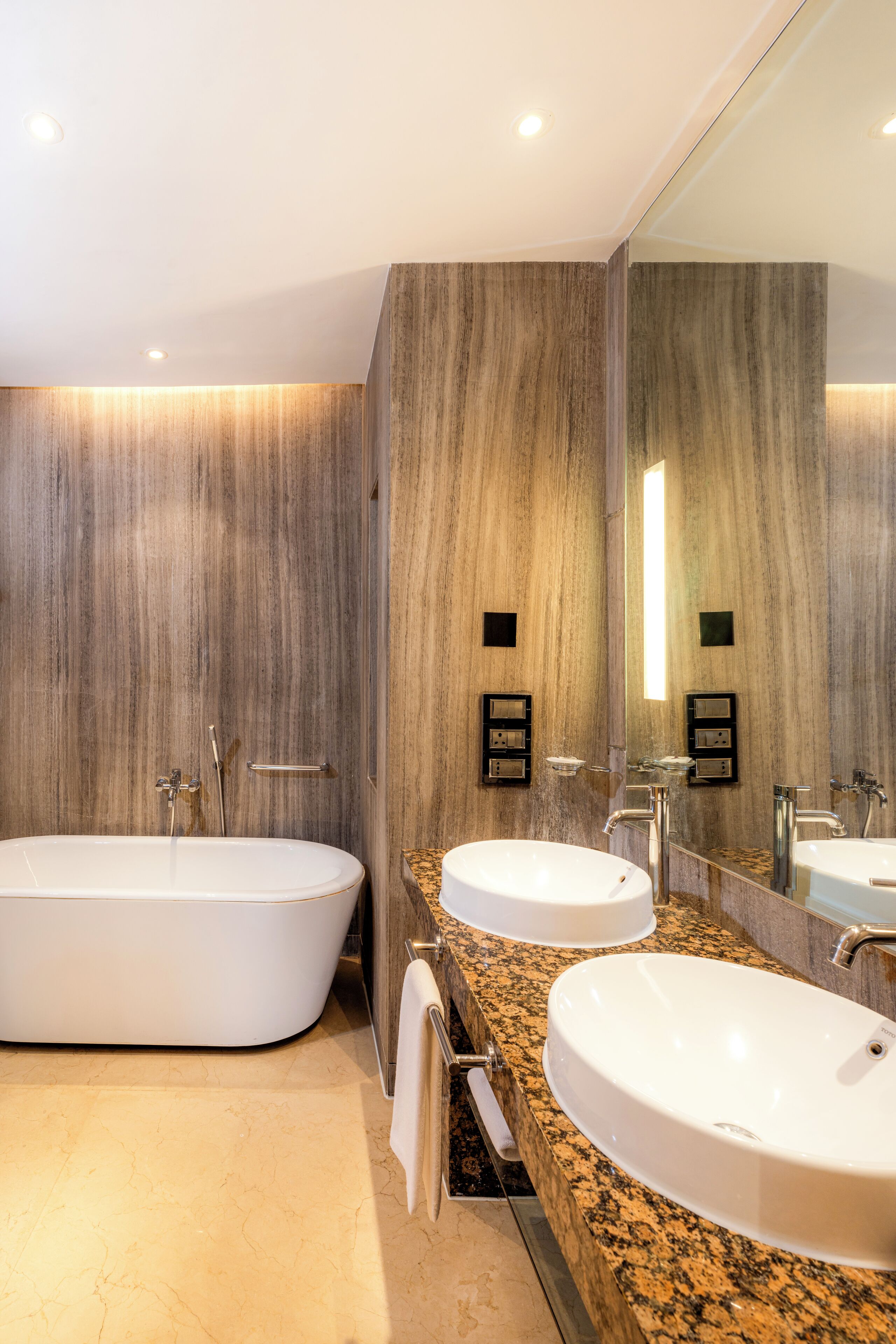 executive apartment, 2 bedrooms | bathroom | combined shower/bathtub, rainfall showerhead, free toiletries