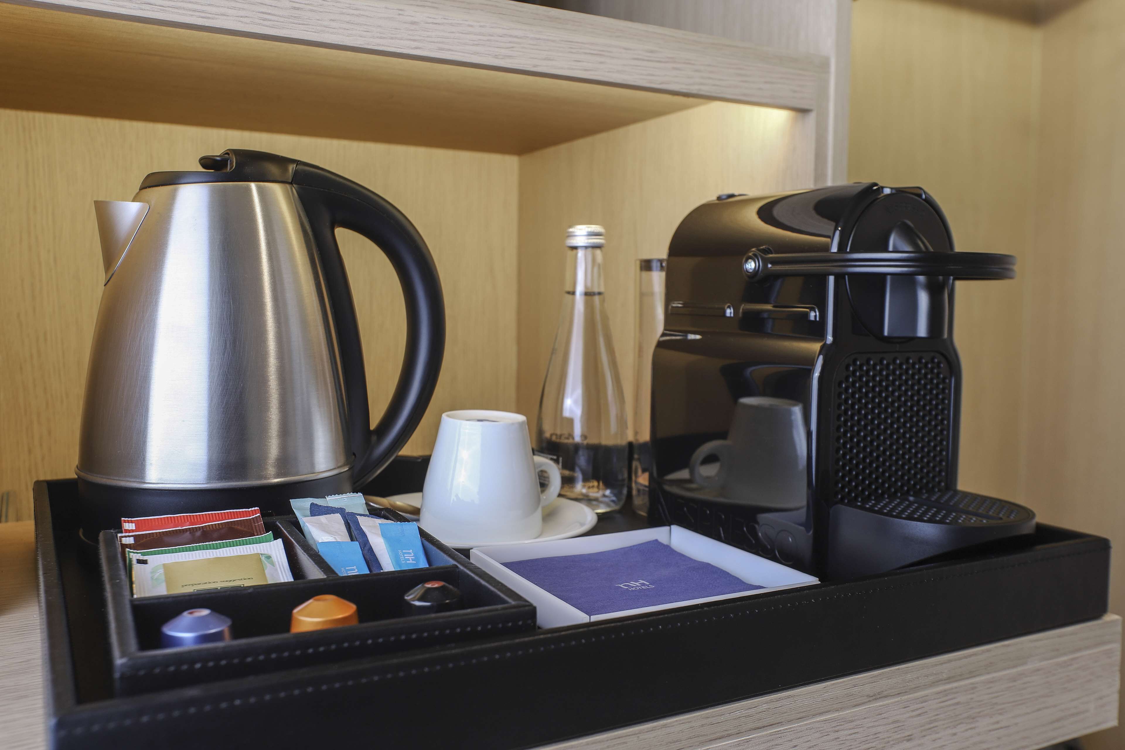 family room | premium bedding, down duvets, minibar, in-room safe