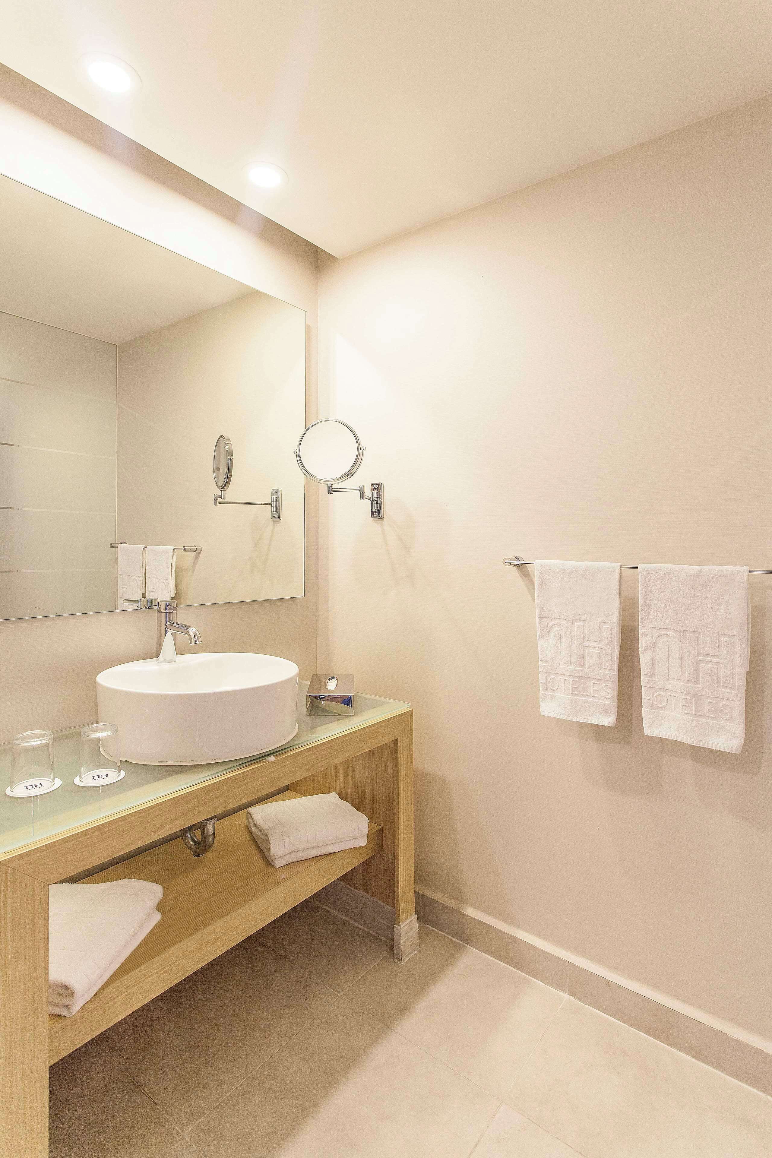 shower, rainfall showerhead, designer toiletries, hair dryer