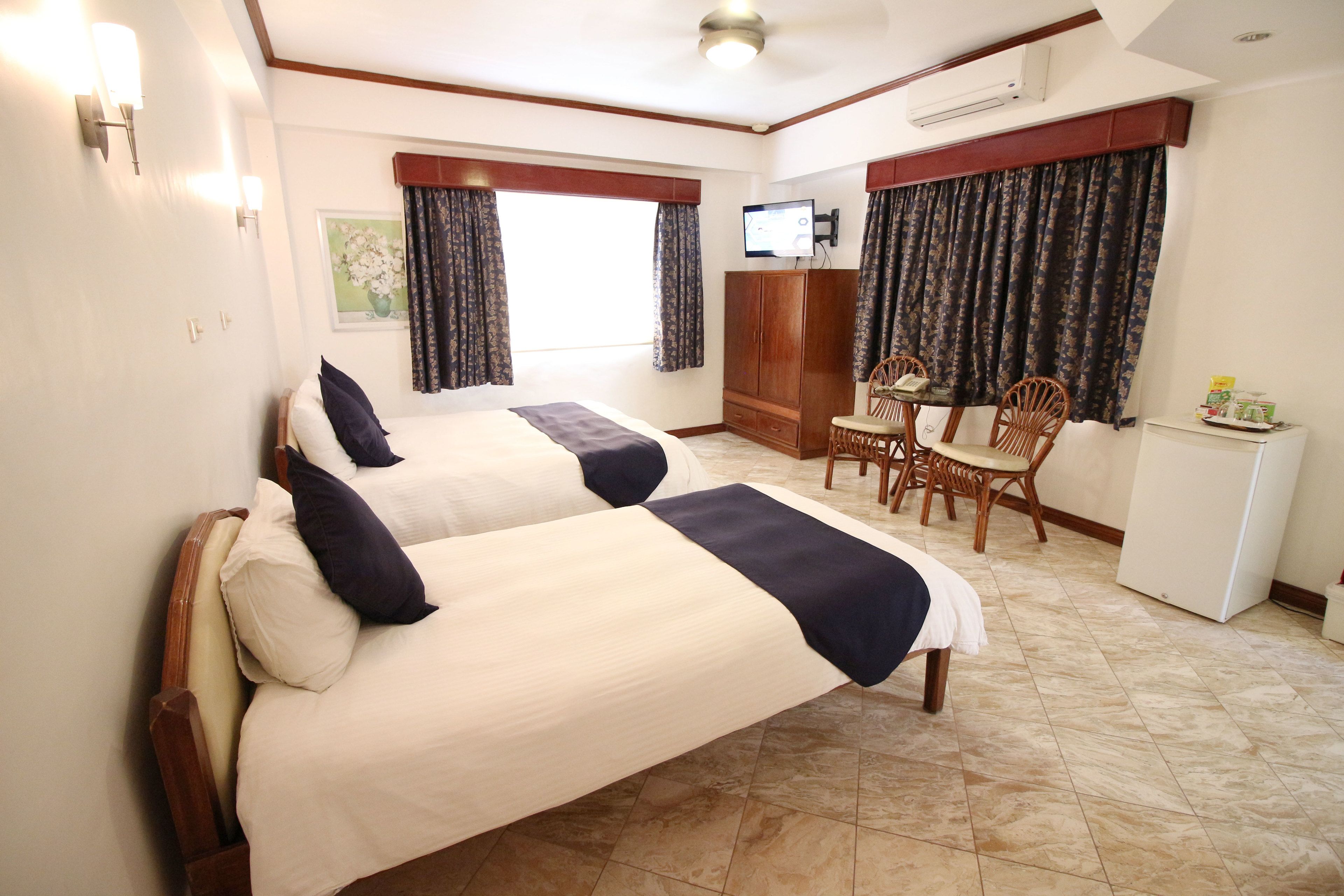 deluxe room | 1 bedroom, minibar, in-room safe, blackout curtains