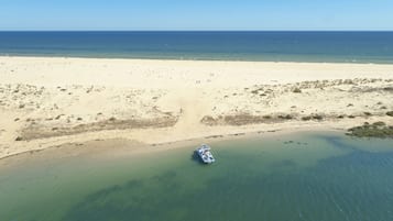 Perto da praia, serviço de traslado de/para a praia grátis 