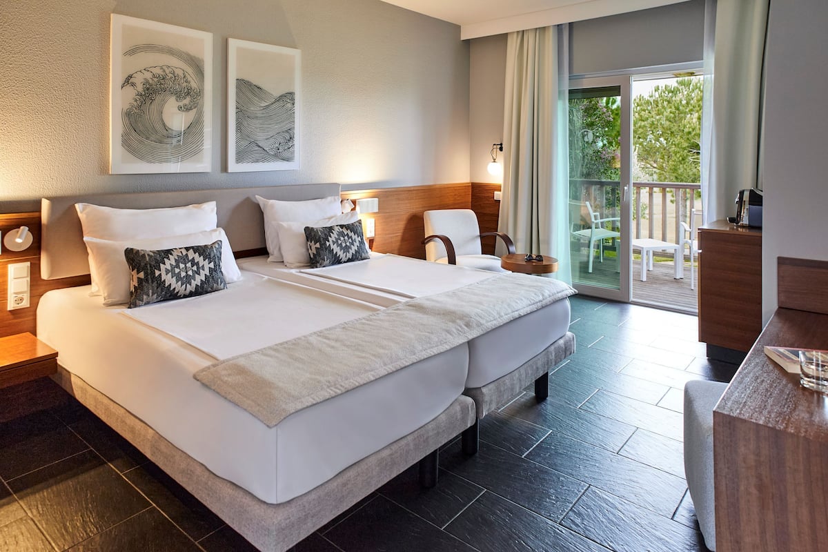 1 habitación, ropa de cama hipoalergénica y minibar