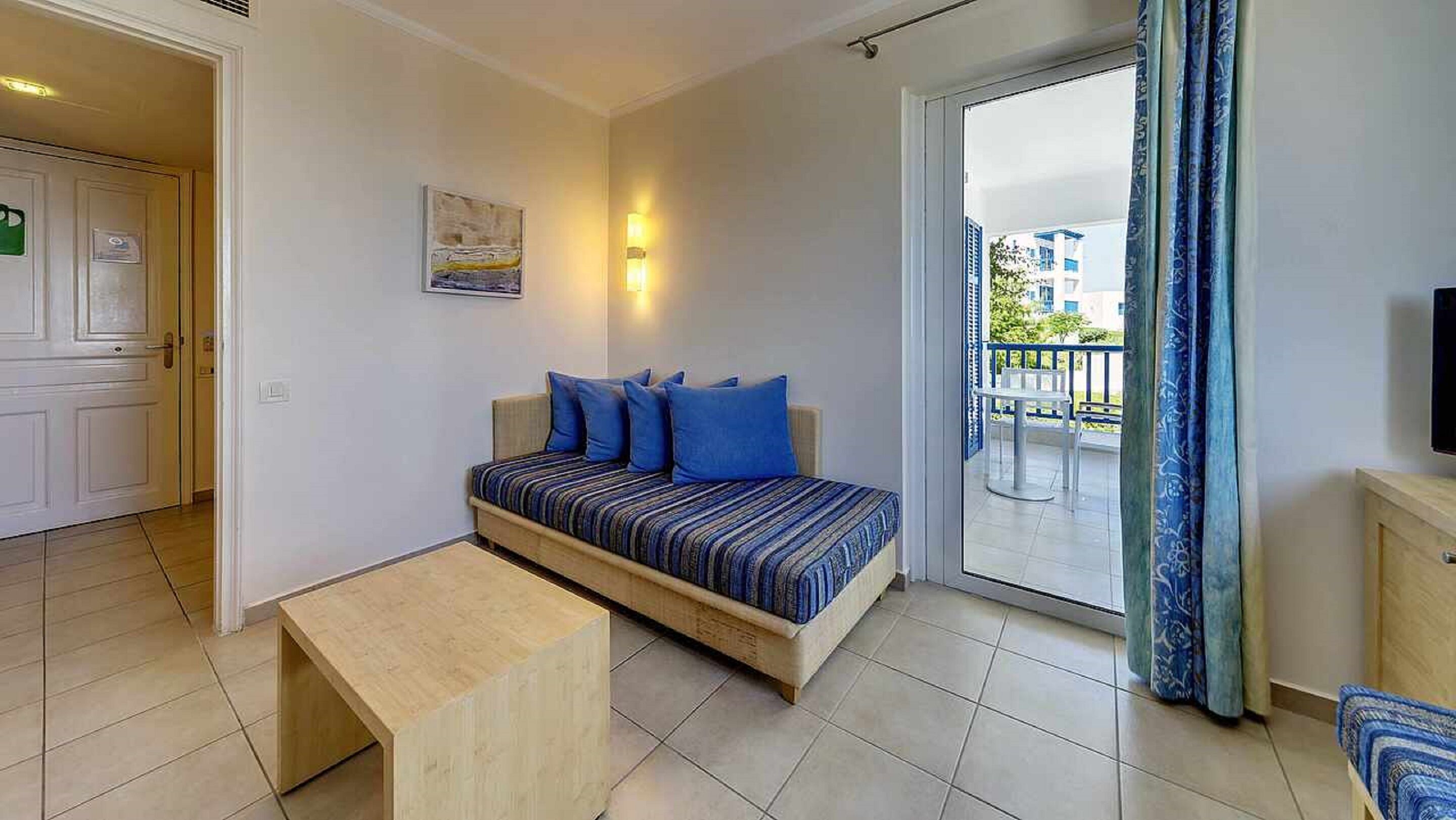 family room (classic) | living area | flat-screen tv, ping pong, books