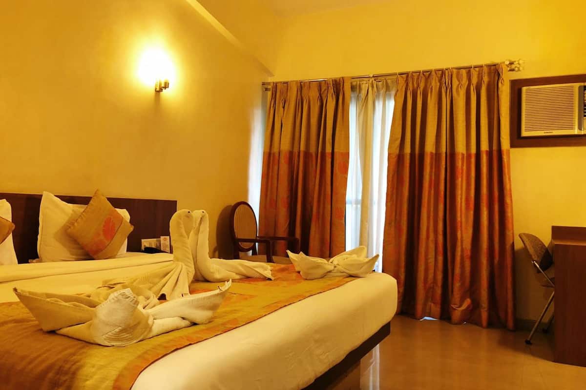 Deluxe Room | 1 bedroom, rollaway beds, free WiFi, bed sheets