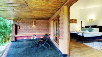 Deluxe Room, Garden View | Terrace/patio