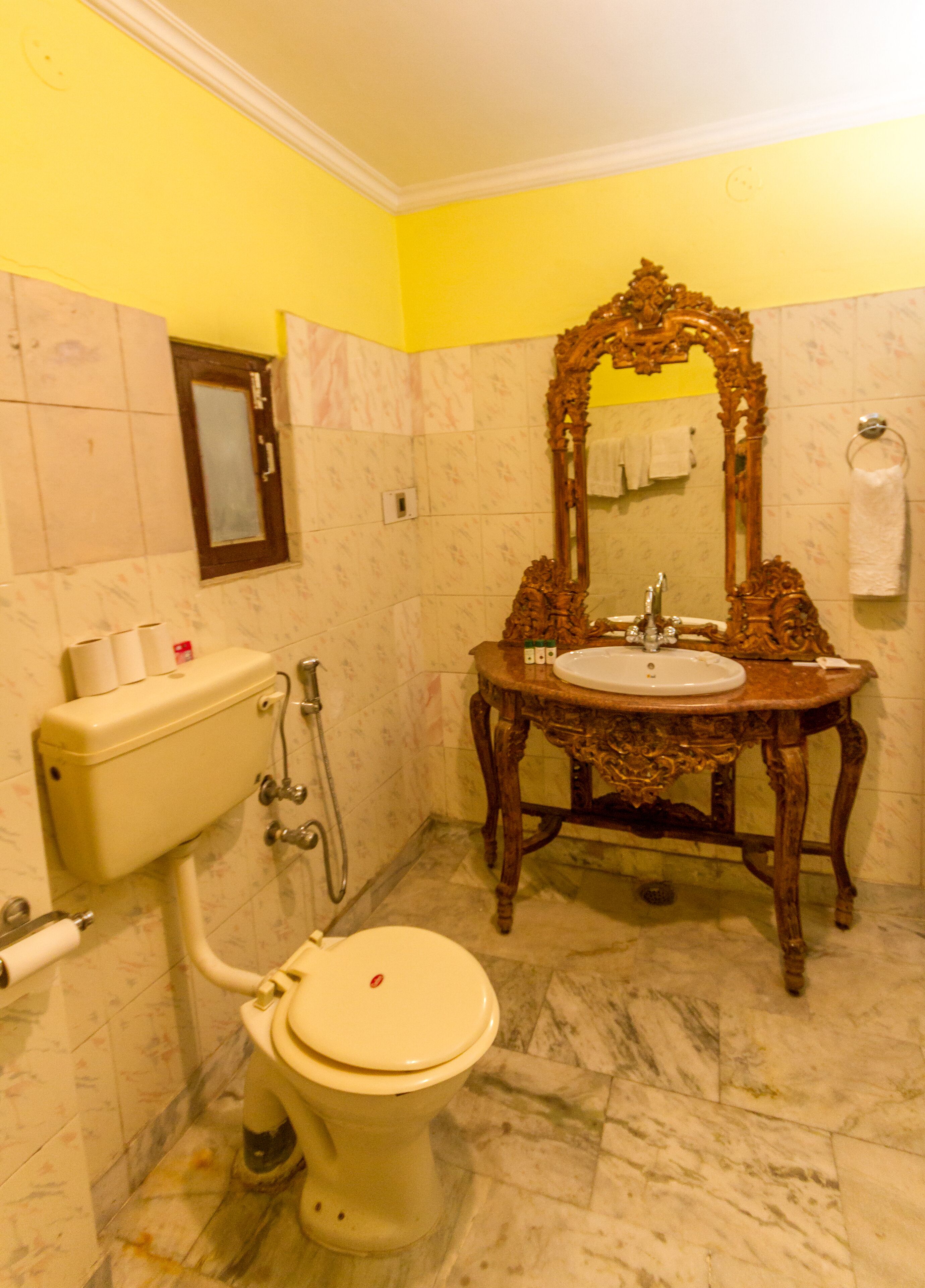 deluxe room | bathroom | designer toiletries, hair dryer, slippers, towels