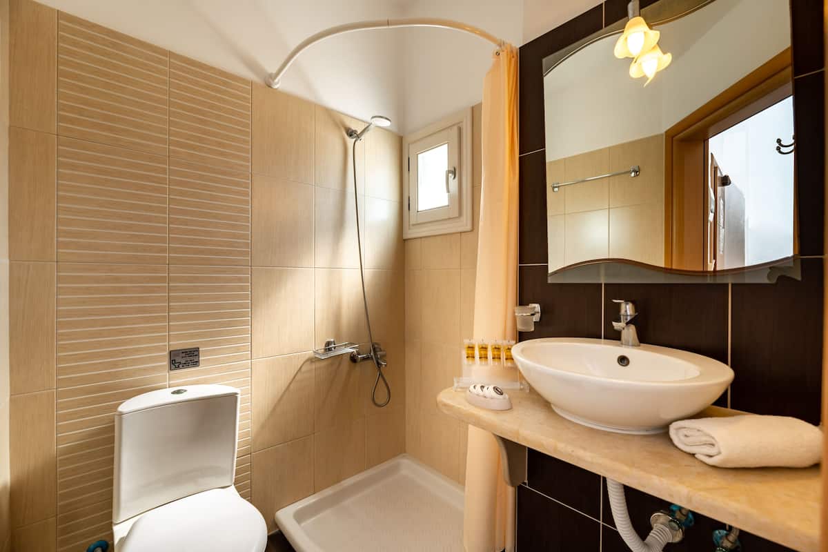 shower, hair dryer, children's dressing gowns, towels