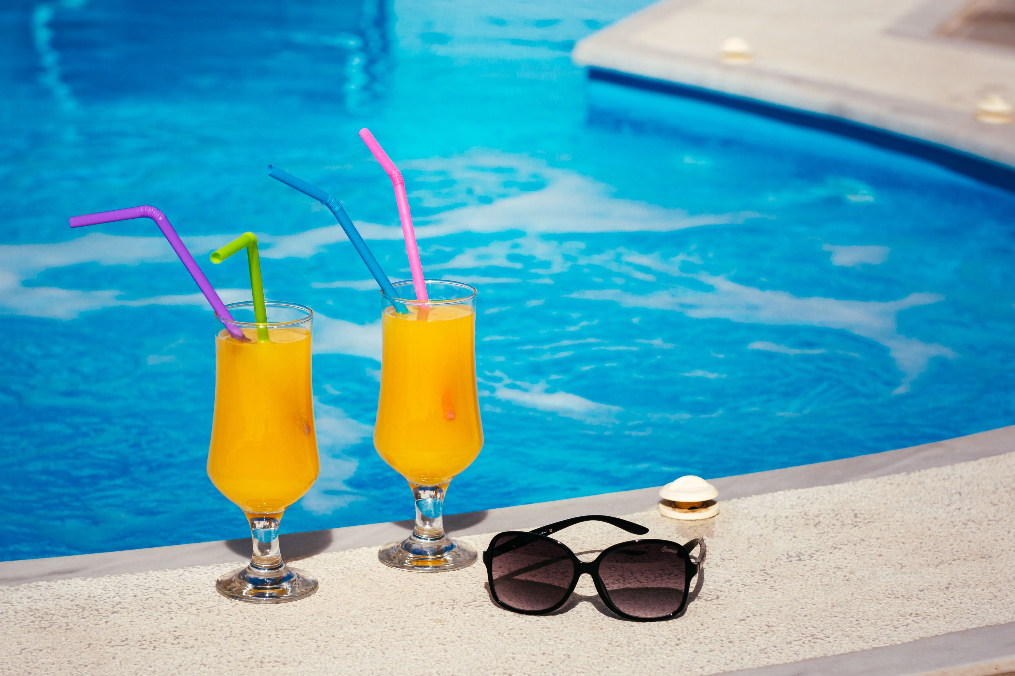 outdoor pool, open 9:00 am to 9:00 pm, pool umbrellas, pool loungers