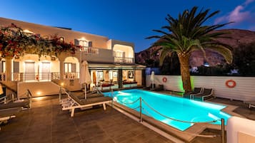 Outdoor pool, open 9:00 AM to 9:00 PM, pool umbrellas, sun loungers