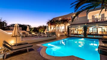 Outdoor pool, open 9:00 AM to 9:00 PM, pool umbrellas, sun loungers