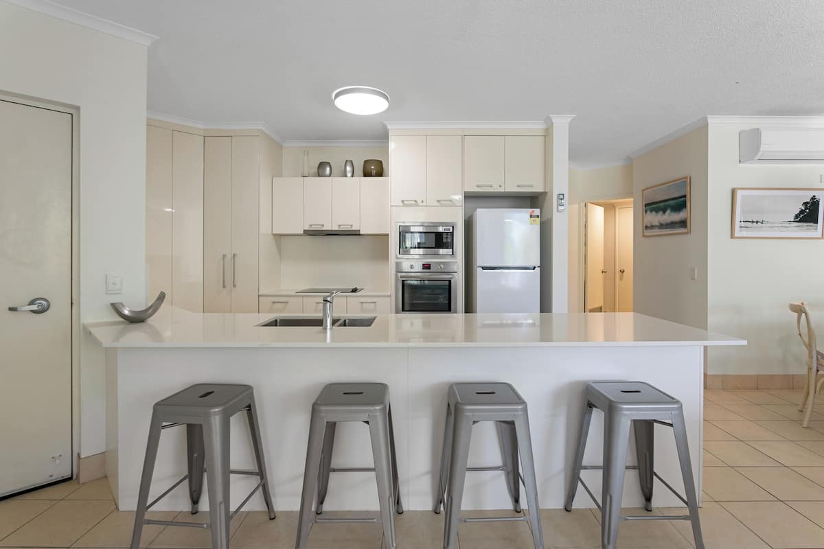Three Bedroom Mid Floor Apartment | Private kitchen | Full-size fridge, microwave, oven, stovetop