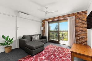 Appartement Exécutif, 1 chambre, cuisine, vue jardin | Coin séjour