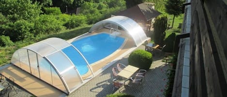 Seasonal outdoor pool, open 8:00 AM to 8:00 PM, sun loungers
