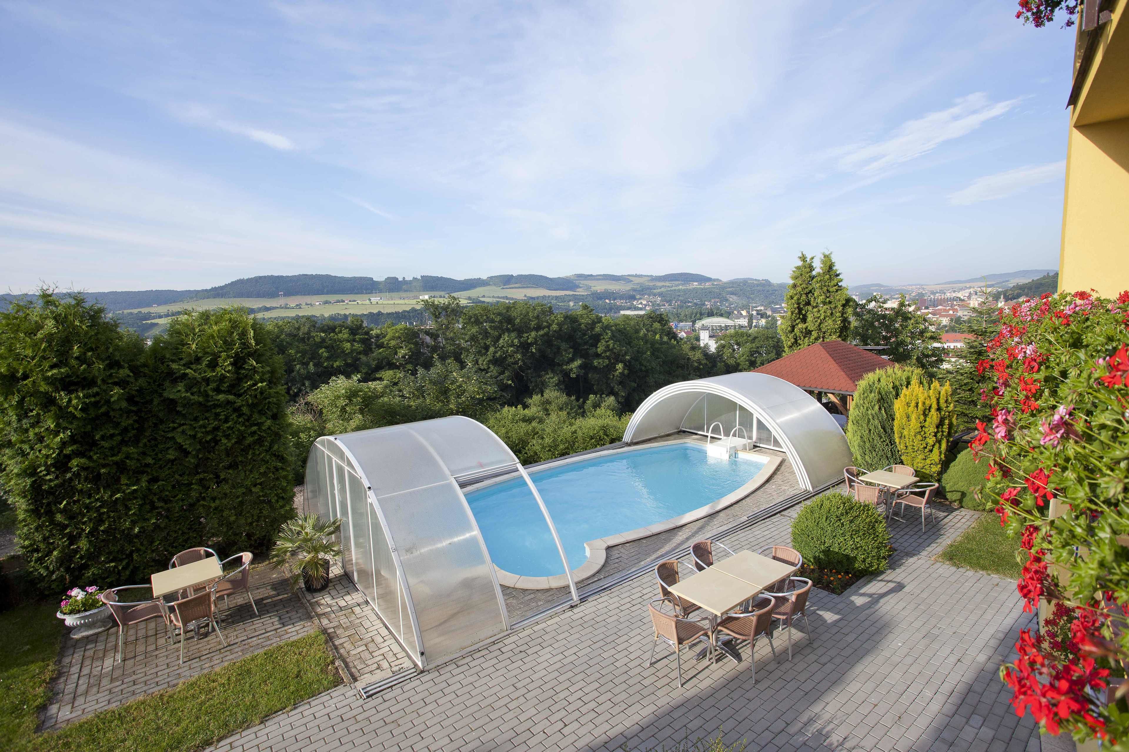 Seasonal outdoor pool, open 8:00 AM to 8:00 PM, sun loungers