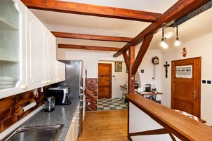 Cafetera/tetera, mesa de comedor