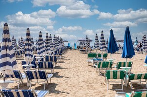 Sun-loungers, beach umbrellas