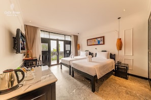 Premium bedding, minibar, in-room safe, desk - Hoi An Coco River Resort & Spa (Da Nang)