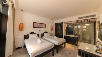 Deluxe Twin Room, Pool View | Premium bedding, minibar, in-room safe, desk