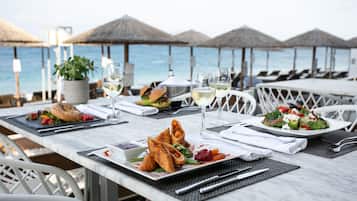 Breakfast, lunch, dinner served; Mediterranean cuisine, beach views