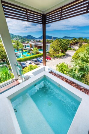 Relax on the spacious balcony with a jacuzzi and take in the panoramic view of the surrounding landscape.