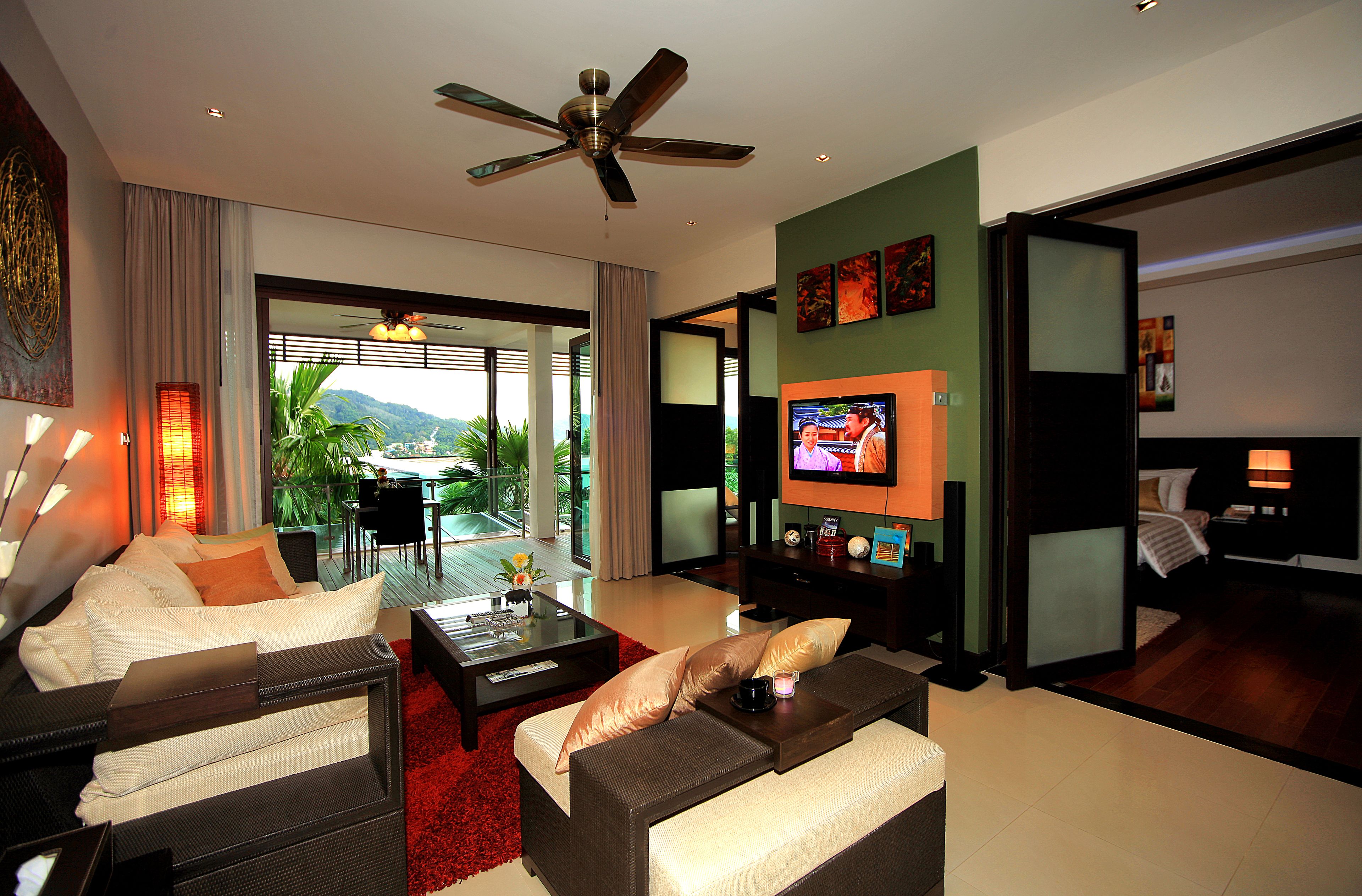 deluxe suite 2 bedroom and living room  | minibar, in-room safe, desk, soundproofing