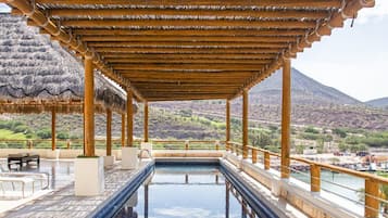 Outdoor pool, pool umbrellas, sun loungers