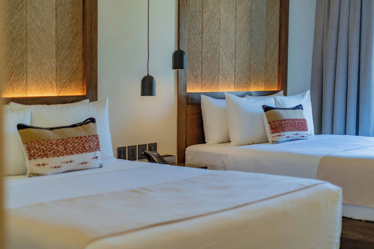 Egyptian cotton sheets, premium bedding, Tempur-Pedic beds, in-room safe