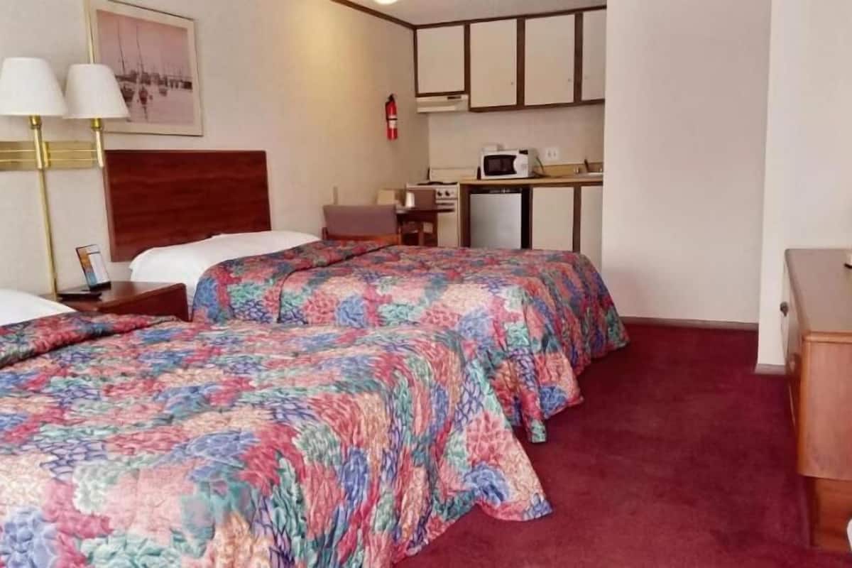 Family Room | Individually furnished, desk, blackout drapes, iron/ironing board