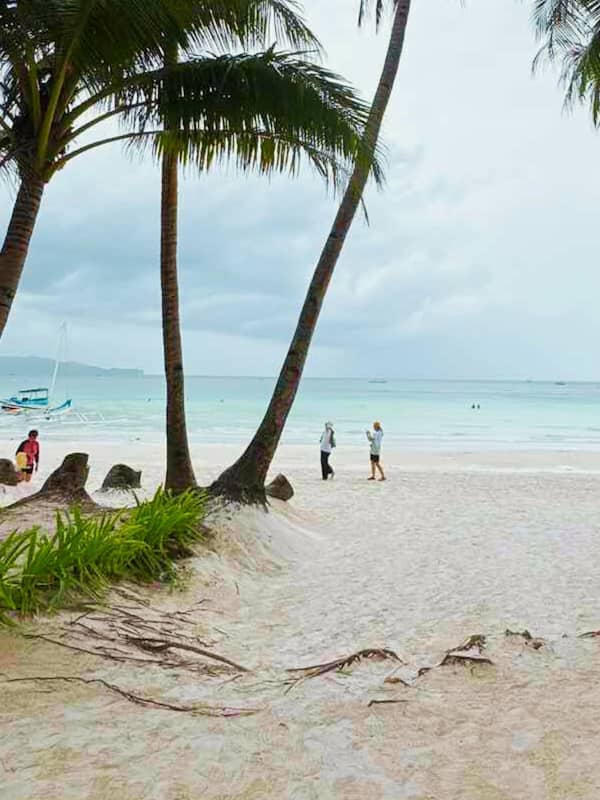On the beach, white sand, beach towels