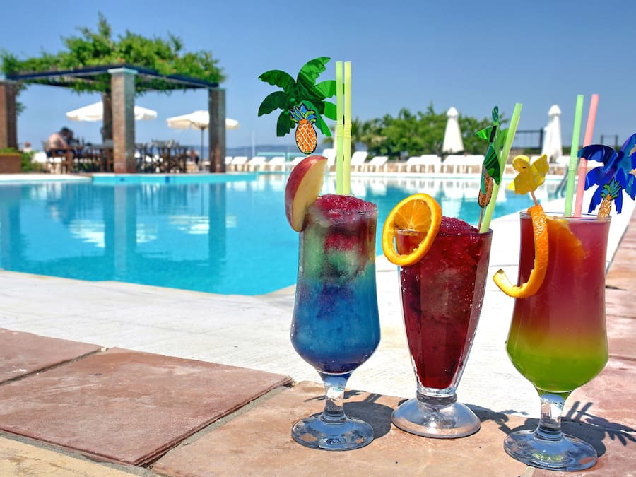 Seasonal outdoor pool, open 7:00 AM to 8:00 PM, pool umbrellas